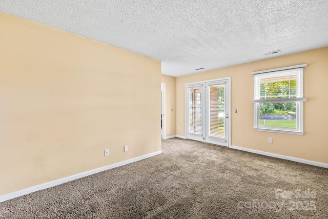 698 Normandy Rd, Mooresville, NC 28117 - empty room featuring carpet flooring and a textured ceiling