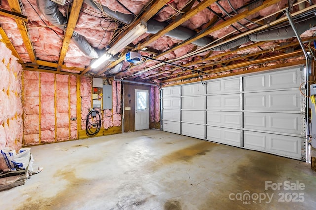 698 Normandy Rd, Mooresville, NC 28117 - garage featuring electric panel and a garage door opener