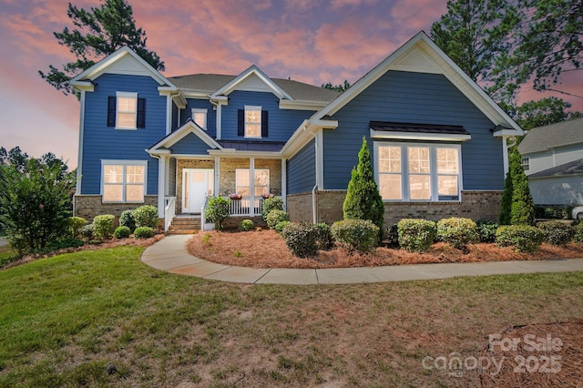 101 Cross Current Ln, Belmont, NC 28012 - view of front of house featuring brick siding, a porch, and a front yard