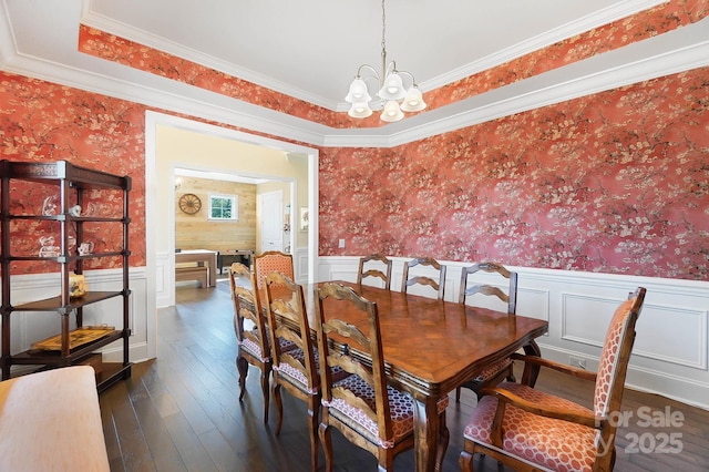 101 Cross Current Ln, Belmont, NC 28012 - dining area with wallpapered walls, a chandelier, wainscoting, dark wood-style floors, and ornamental molding