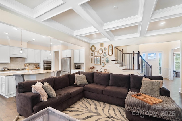 101 Cross Current Ln, Belmont, NC 28012 - living room featuring coffered ceiling, stairs, light wood finished floors, beam ceiling, and ornamental molding
