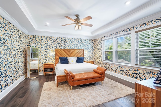 101 Cross Current Ln, Belmont, NC 28012 - bedroom with wallpapered walls, dark wood-type flooring, crown molding, a tray ceiling, and a ceiling fan