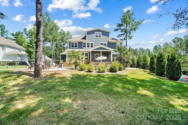 101 Cross Current Ln, Belmont, NC 28012 - rear view of house with a sunroom and a patio area
