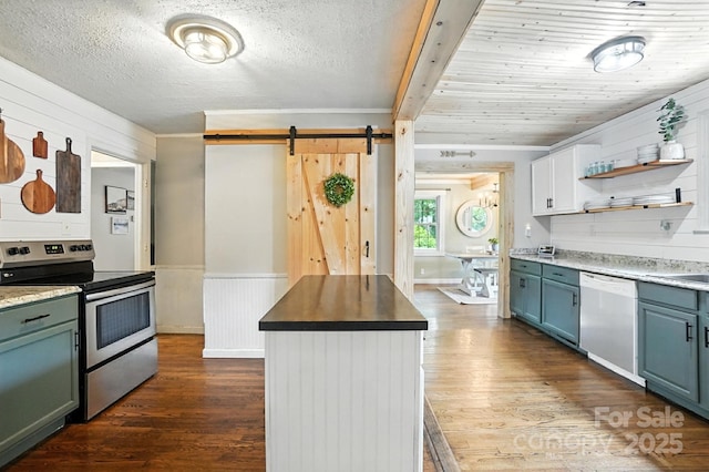 602 Unity St, Fort Mill, SC 29715 - kitchen with electric range, white dishwasher, a barn door, dark wood-type flooring, and crown molding