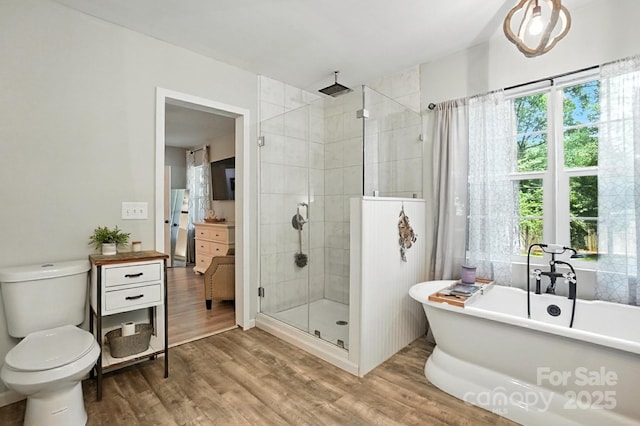 602 Unity St, Fort Mill, SC 29715 - bathroom featuring a stall shower, wood finished floors, and a soaking tub