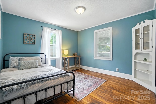 602 Unity St, Fort Mill, SC 29715 - bedroom with a textured ceiling, wood-type flooring, and crown molding