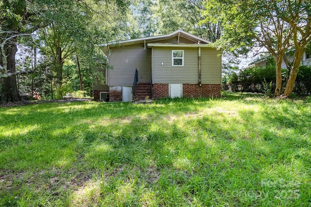 1224 Hollywood Ter, Albemarle, NC 28001 - view of home's exterior with a cooling unit and a yard