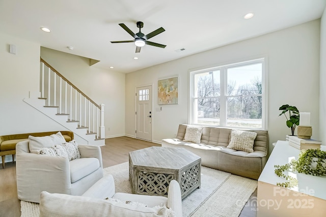 709 Catawba St, Lincolnton, NC 28092 - living room featuring a ceiling fan, light wood-style flooring, stairway, and recessed lighting