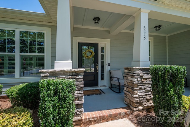 658 Gardenbrook Trl, Belmont, NC 28012 - view of exterior entry with a porch