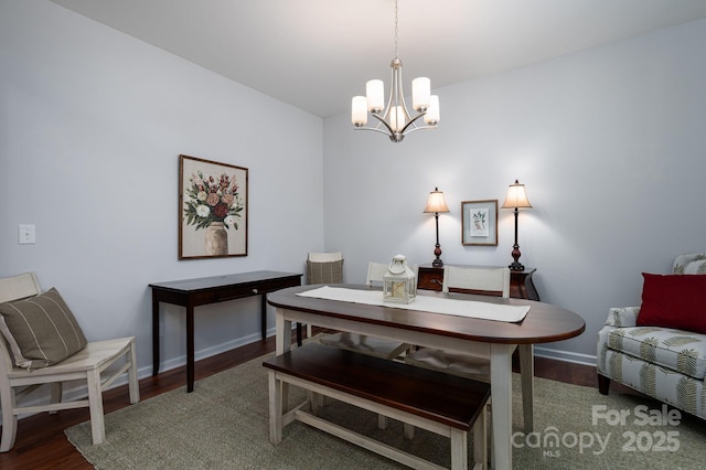 658 Gardenbrook Trl, Belmont, NC 28012 - dining area with a chandelier and wood finished floors