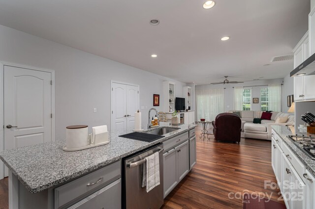 658 Gardenbrook Trl, Belmont, NC 28012 - kitchen featuring stainless steel appliances, gray cabinets, ceiling fan, open floor plan, and dark wood-style floors