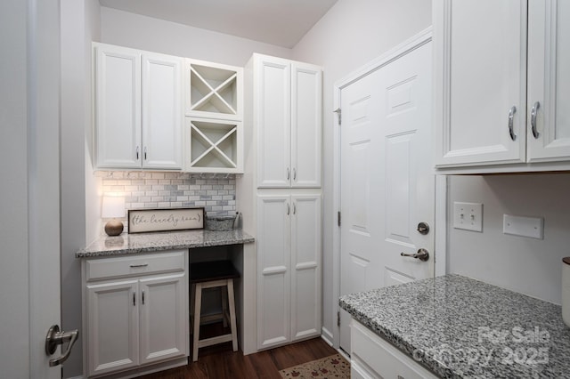 658 Gardenbrook Trl, Belmont, NC 28012 - kitchen with dark wood-style flooring, white cabinets, and light stone countertops