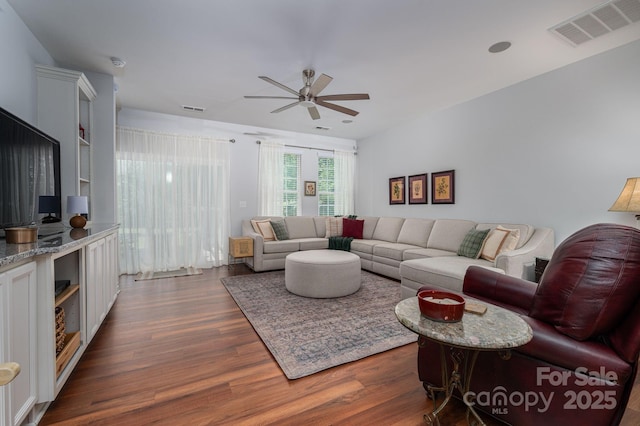 658 Gardenbrook Trl, Belmont, NC 28012 - living room with ceiling fan and dark wood-type flooring