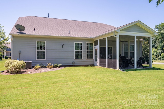 658 Gardenbrook Trl, Belmont, NC 28012 - rear view of house featuring a sunroom, a lawn, roof with shingles, and a ceiling fan