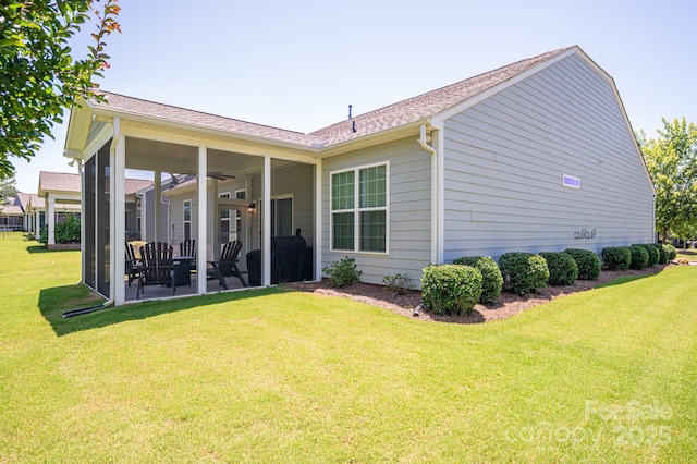 658 Gardenbrook Trl, Belmont, NC 28012 - rear view of property featuring a sunroom, a yard, a ceiling fan, and roof with shingles