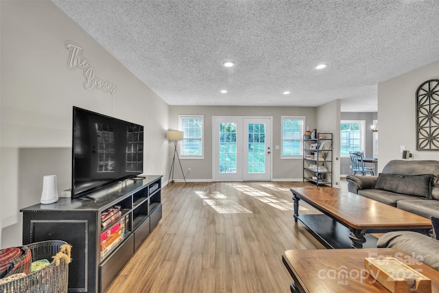 5476 Twelve Oak Ln, Conover, NC 28613 - living area with a textured ceiling, plenty of natural light, light wood finished floors, and recessed lighting