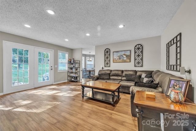 5476 Twelve Oak Ln, Conover, NC 28613 - living area with a textured ceiling, recessed lighting, and light wood finished floors