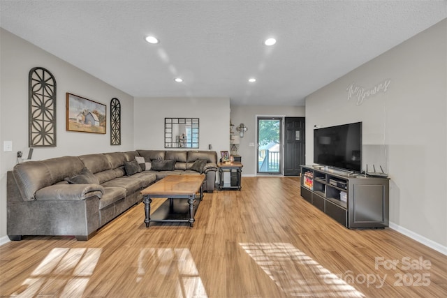 5476 Twelve Oak Ln, Conover, NC 28613 - living area with light wood-style flooring, recessed lighting, and a textured ceiling