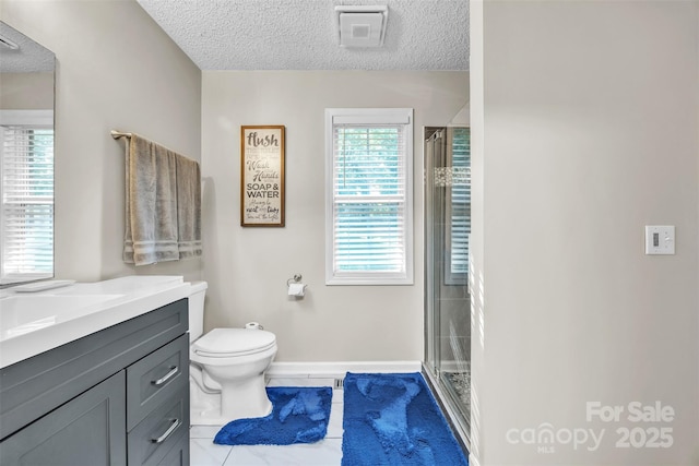 5476 Twelve Oak Ln, Conover, NC 28613 - bathroom with vanity, a shower with curtain, a textured ceiling, and tile patterned floors