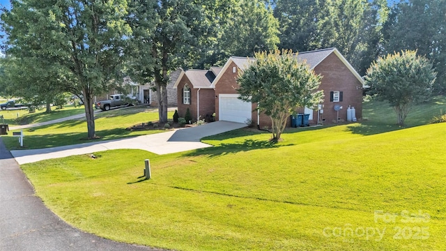 5476 Twelve Oak Ln, Conover, NC 28613 - view of front of home featuring brick siding, a front yard, concrete driveway, and an attached garage
