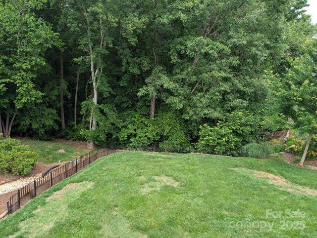 1764 Pipers Ridge Cir NW, Conover, NC 28613 - view of yard featuring a forest view