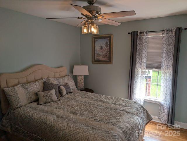 1764 Pipers Ridge Cir NW, Conover, NC 28613 - bedroom featuring light wood-style floors and a ceiling fan