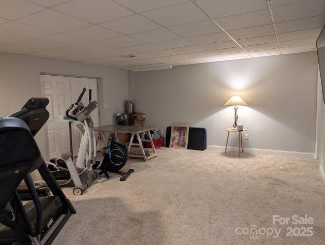 1764 Pipers Ridge Cir NW, Conover, NC 28613 - exercise room featuring carpet floors and a paneled ceiling