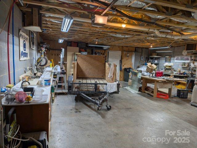 1764 Pipers Ridge Cir NW, Conover, NC 28613 - below grade area with a workshop area