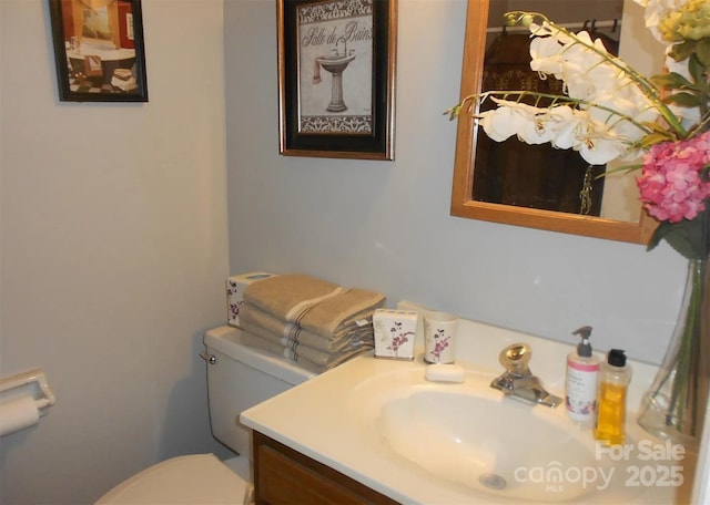 6148 Meadow Rose Ln, Charlotte, NC 28215 - half bathroom with vanity and toilet