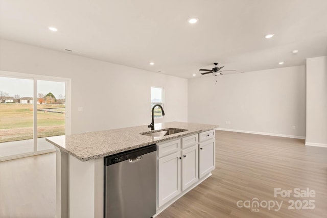 1048 Russell Dr, Winston Salem, NC 27127 - kitchen featuring dishwasher, plenty of natural light, light wood finished floors, an island with sink, and recessed lighting