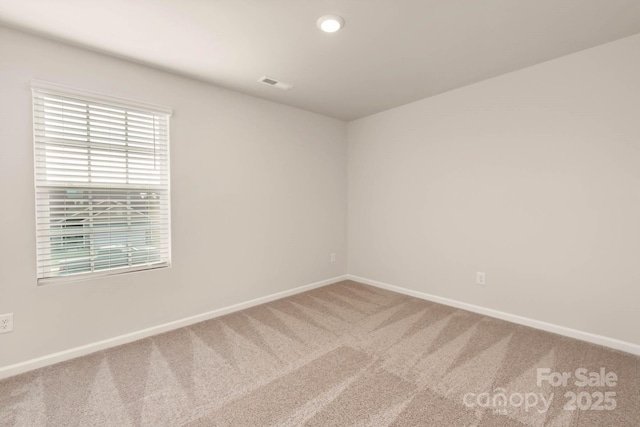 1048 Russell Dr, Winston Salem, NC 27127 - carpeted empty room with baseboards