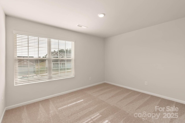 1048 Russell Dr, Winston Salem, NC 27127 - carpeted empty room with baseboards and recessed lighting