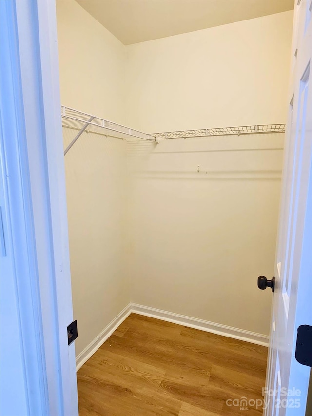 3106 Faircroft Way, Monroe, NC 28110 - spacious closet featuring wood finished floors
