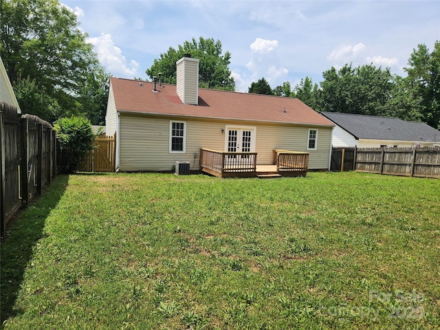 3106 Faircroft Way, Monroe, NC 28110 - back of property featuring a deck, a fenced backyard, french doors, and a chimney