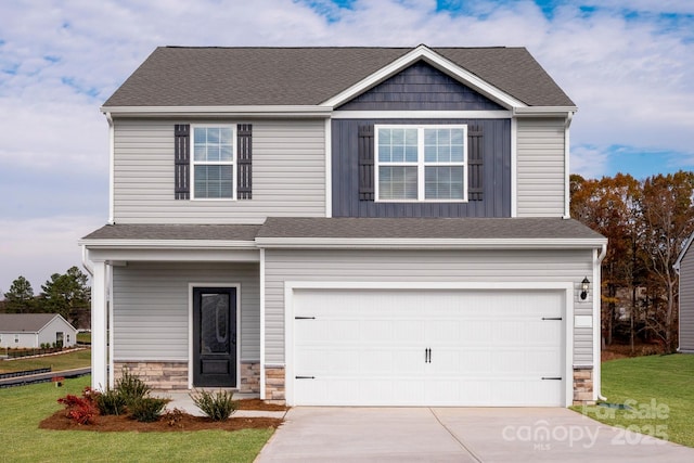 1072 Russell Dr, Winston Salem, NC 27127 - craftsman house featuring driveway, an attached garage, a front yard, stone siding, and a shingled roof