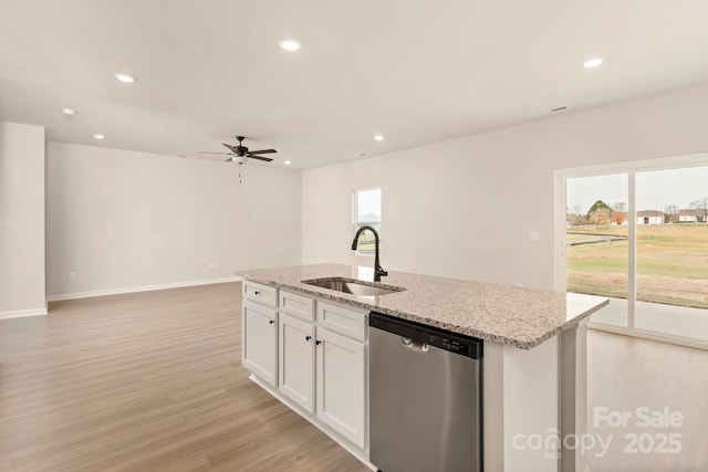 1072 Russell Dr, Winston Salem, NC 27127 - kitchen with dishwasher, healthy amount of natural light, recessed lighting, ceiling fan, and an island with sink
