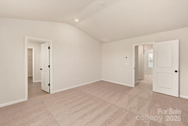 1072 Russell Dr, Winston Salem, NC 27127 - empty room with carpet flooring and vaulted ceiling