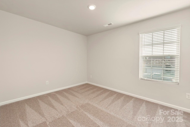 1072 Russell Dr, Winston Salem, NC 27127 - carpeted empty room with baseboards