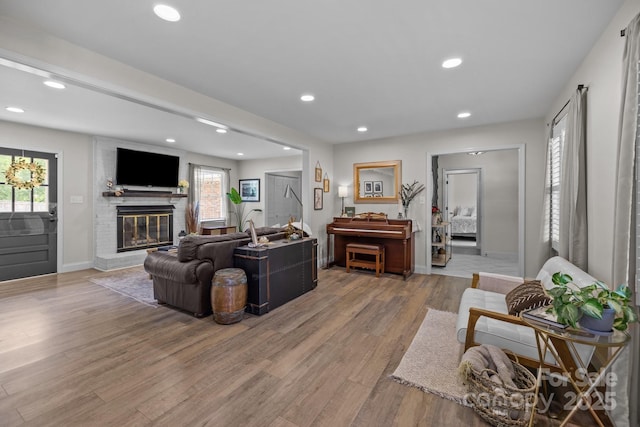 115 Fox Run Dr, Fort Mill, SC 29715 - living room featuring light wood-style floors, recessed lighting, and a brick fireplace