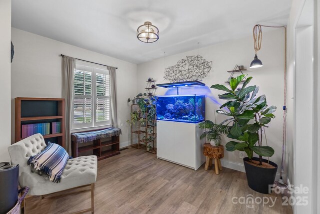 115 Fox Run Dr, Fort Mill, SC 29715 - living area featuring wood finished floors and baseboards