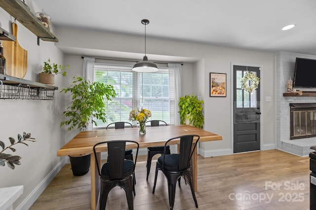 115 Fox Run Dr, Fort Mill, SC 29715 - dining space with plenty of natural light, wood finished floors, a brick fireplace, and recessed lighting