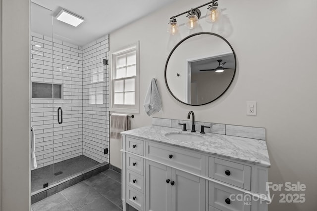 115 Fox Run Dr, Fort Mill, SC 29715 - bathroom featuring vanity, a stall shower, tile patterned floors, and ceiling fan