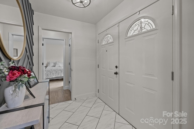 115 Fox Run Dr, Fort Mill, SC 29715 - foyer featuring light marble finish flooring and baseboards