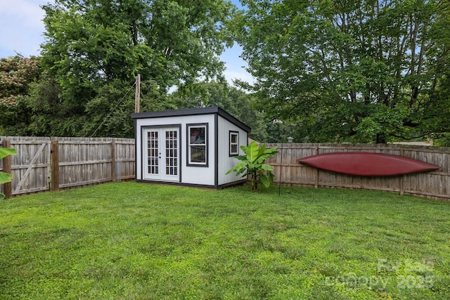 115 Fox Run Dr, Fort Mill, SC 29715 - fenced backyard with french doors and an outdoor structure