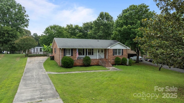 115 Fox Run Dr, Fort Mill, SC 29715 - ranch-style home with brick siding, a porch, driveway, a front yard, and roof with shingles