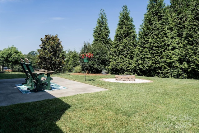 1156 Mckee Farm Ln, Belmont, NC 28012 - view of yard featuring a fire pit and a patio