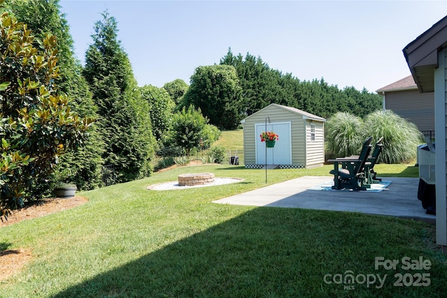 1156 Mckee Farm Ln, Belmont, NC 28012 - view of yard with a fire pit, a storage unit, and a patio area