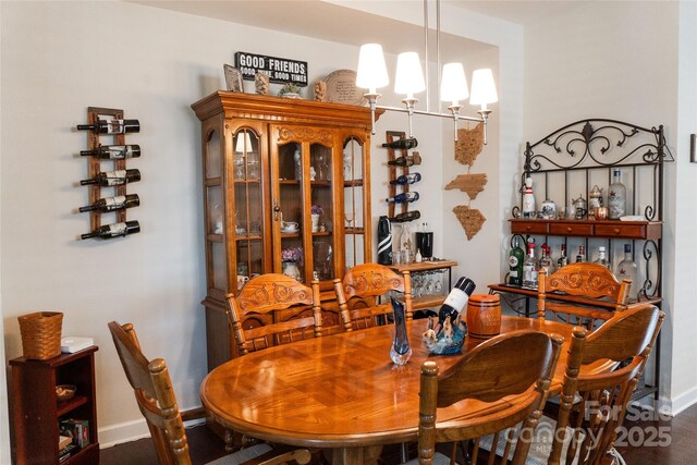 1156 Mckee Farm Ln, Belmont, NC 28012 - dining space with baseboards and a chandelier