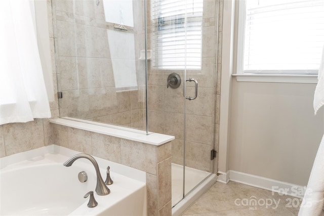 1156 Mckee Farm Ln, Belmont, NC 28012 - full bath featuring a stall shower, a bath, and tile patterned flooring