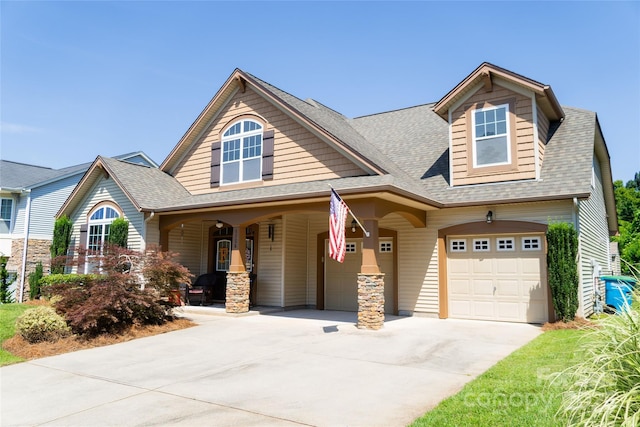 1156 Mckee Farm Ln, Belmont, NC 28012 - view of front facade with roof with shingles, driveway, a garage, and a porch